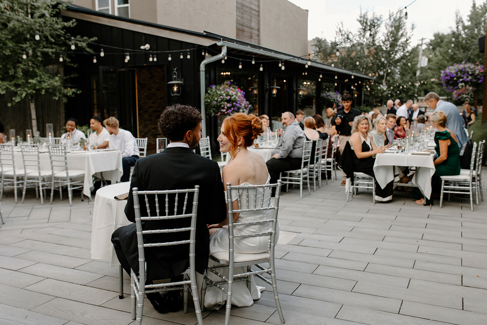 couple with a saintly love at their reception