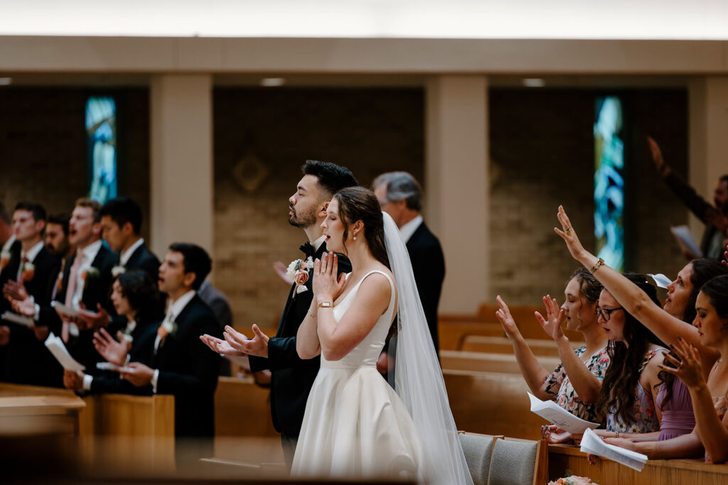 singing praise & worship at a Catholic wedding